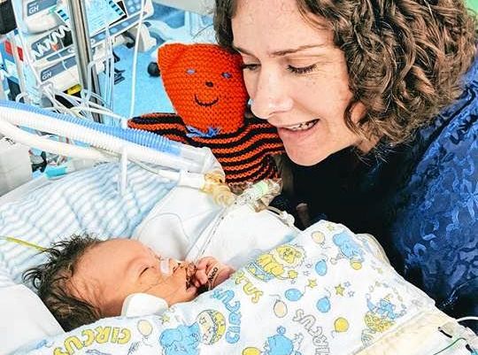 ALL THE LOVE IN THE WORLD: Mum Rebecca Domorev at Andrew's side. Picture: Contributed