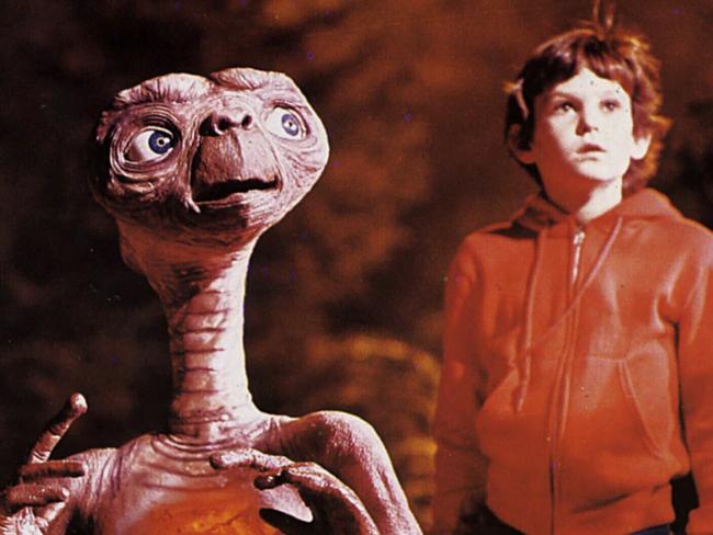 1982. ET character and child actor Henry Thomas in a scene from the film E.T. the Extra-Terrestrial.