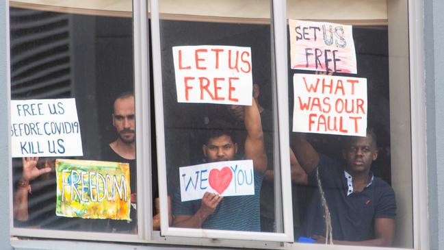 Police fine Refugee supporters who held a car cavalcade protest. Picture: Tony Gough