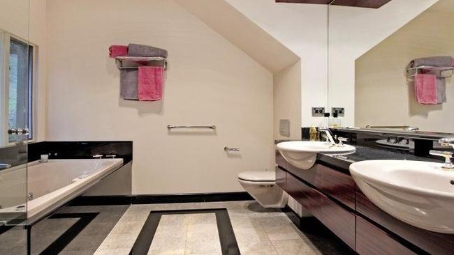 Inside the high-end bathroom with double vanities.