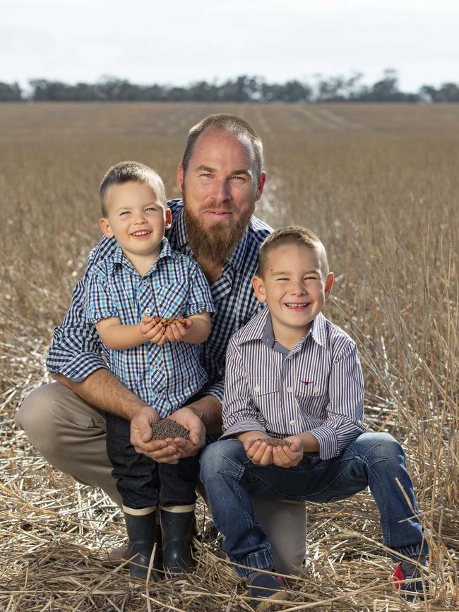 Kyle Pearse with sons Ted and Jack on their Donald property. Picture: Zoe Phillips