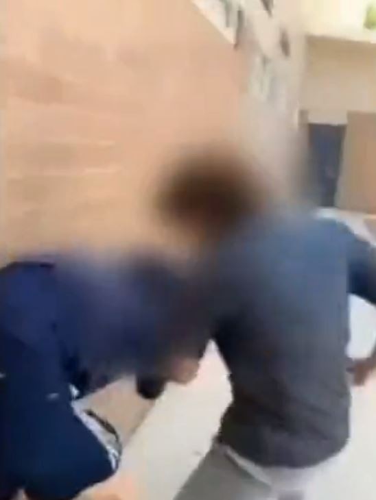 A second clip shows the student punching a male student. Picture: Nine