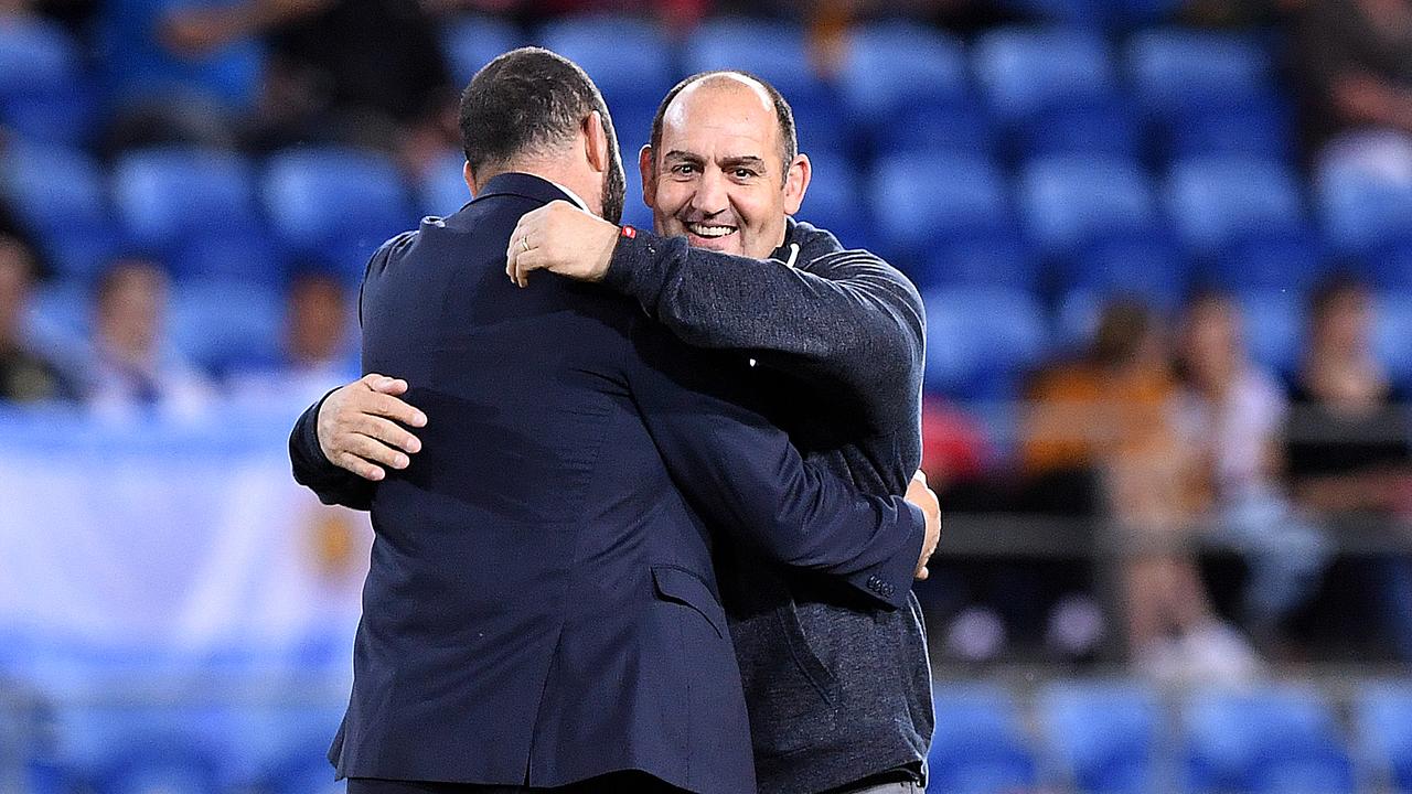 Pumas coach Mario Ledesma (right) embraces Wallabies coach Michael Cheika prior to kick-off.