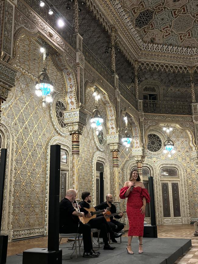 Fado performance in Porto's Palacio da Bolsa.