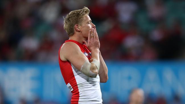 Isaac Heeney reacts after missing a shot at goal. Picture: Jason McCawley/AFL Photos/via Getty Images