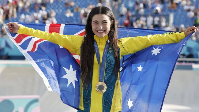 Arisa Trew proudly shows off her gold medal. Picture: Michael Klein