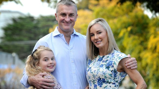 Tom Elliott from 3AW with his wife Elise and daughter Ava. Picture: Andrew Henshaw