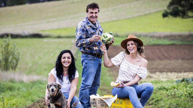 Emma grows vegetables with her dad Laurie Germano and Sallie Jones, who is the Gippsland Jersey co-founder, pictured with Molly the kelpie. Picture: Nicole Cleary