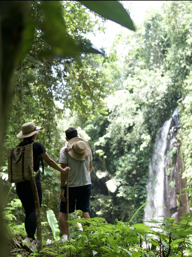 Waterfall trekking at Buahan, a Banyan Tree resort.