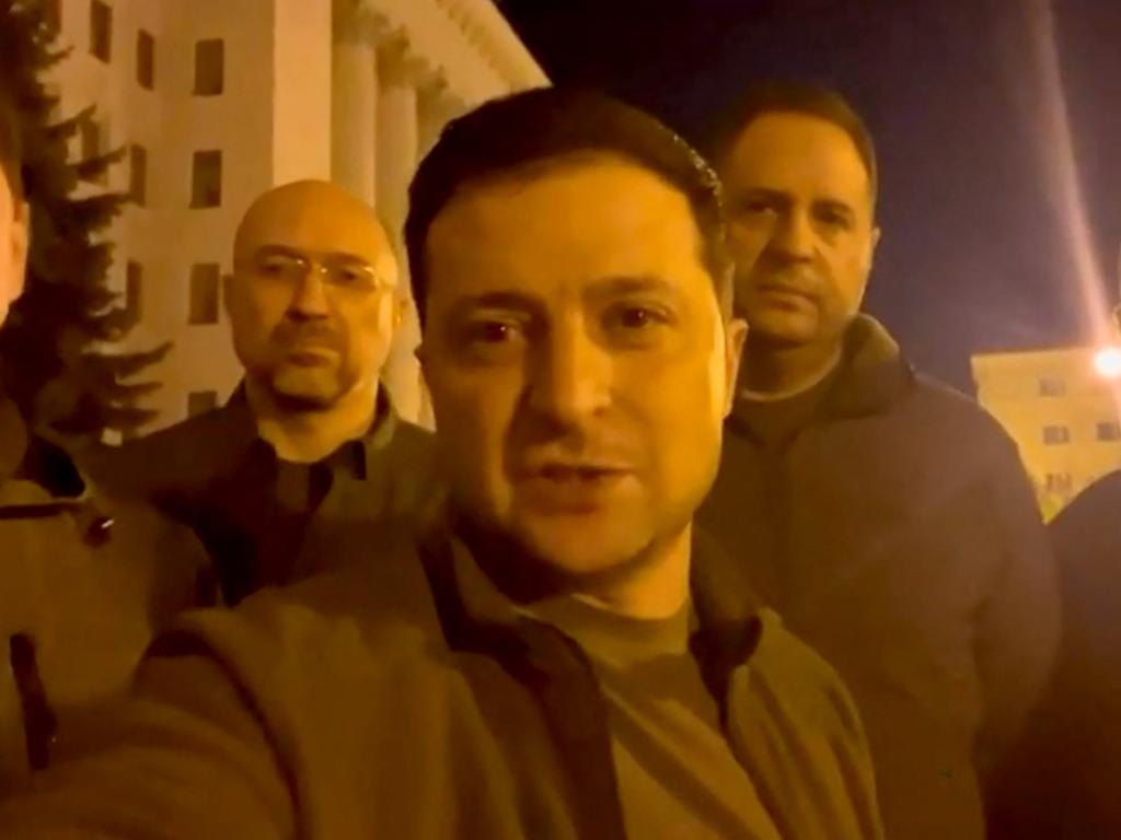 President of Ukraine Volodymyr Zelensky says 'we are all here' in Kyiv in a video posted on his Facebook account, standing near the presidency building. Picture: AFP