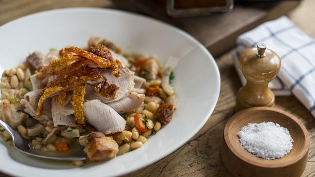 Du Fermier’s pork loin with crackling and cassoulet. Pictures: Eugene Hyland