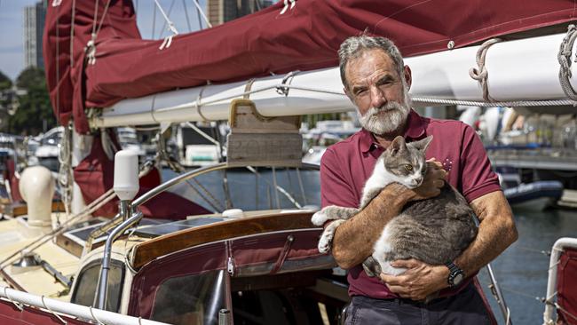 SYDNEY, AUSTRALIA, NOVEMBER 22, 2023. Sylph VI skipper and owner Robert â€˜Bobâ€™ Williams with his cat Oli who will sail with Bob in the Sydney to Hobart yacht race on board Sylph VI. Photographer: Adam Yip