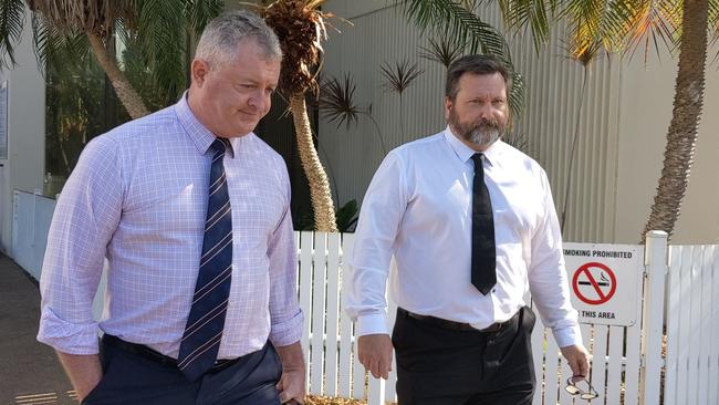 NT police officer Matthew Lea-Smith, right, with his lawyer Ray Murphy leave Darwin Local Court.