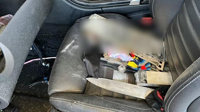 Dangerous items like a knife and drug utensils were found inside a recovered stolen Mercedes-Benz C300 coupe.