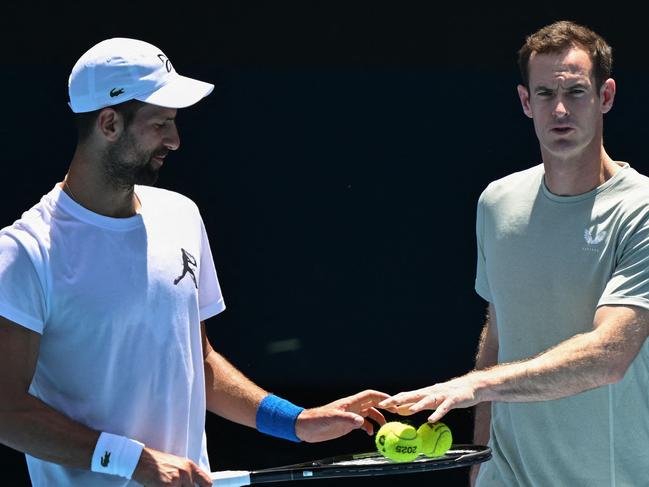 Serbia's Novak Djokovic and his coach Andy Murray talk during a practice session ahead of the Australian Open. Picture: William West/AFP