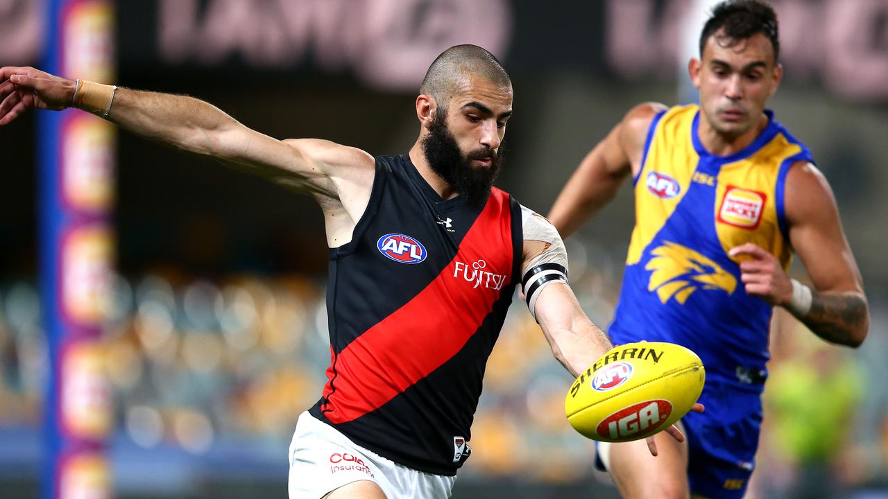 There are growing hopes that Adam Saad will remain at Essendon. Photo: Jono Searle/AFL Photos/via Getty Images.