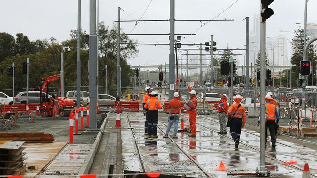 Construction workers at the Broadbeach South light rail station. Picture: Brendan Radke.