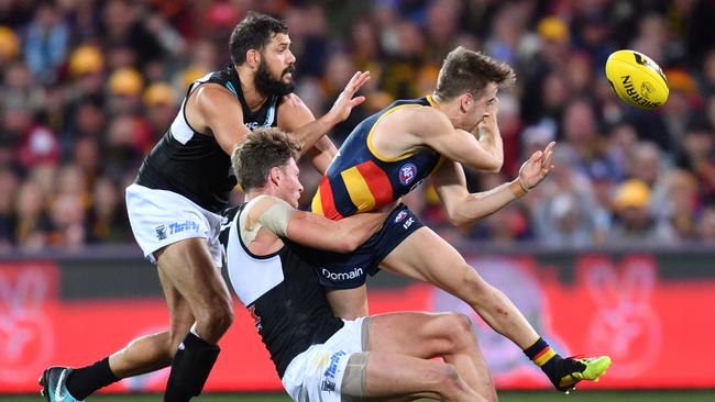 Jordan Gallucci gets the all-important final centre clearance of Saturday night’s Showdown after he ran off the back the square and into space. Picture: David Mariuz (AAP).