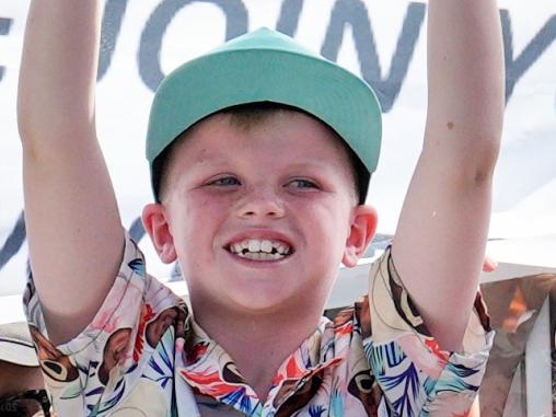 Young Fisher fan Beau Franklin, 9, was lucky enough to do a shoey with his favourite DJ. Picture: Tim Joy