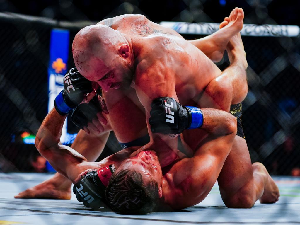 Alexander Volkanovski lands a vicious elbow during his war with Brian Ortega. Picture: Alex Bierens de Haan/Getty