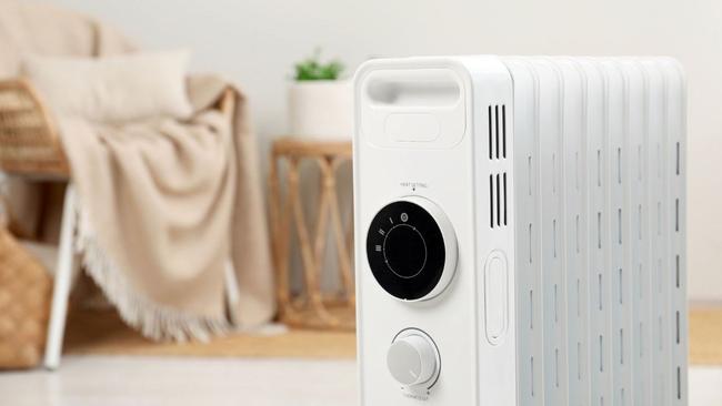 Stay cosy with one of the best types of heaters for long lasting warmth, even when you've switched it off. Picture: iStock/Liudmila Chernetska.