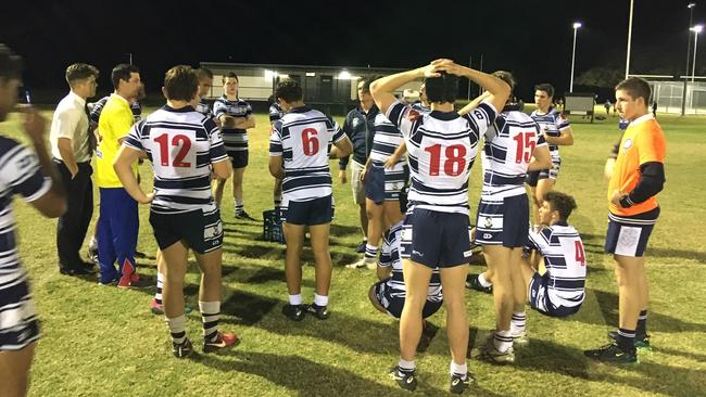 St Mary's Toowoomba players about to listen to their coach Rob Anderson.