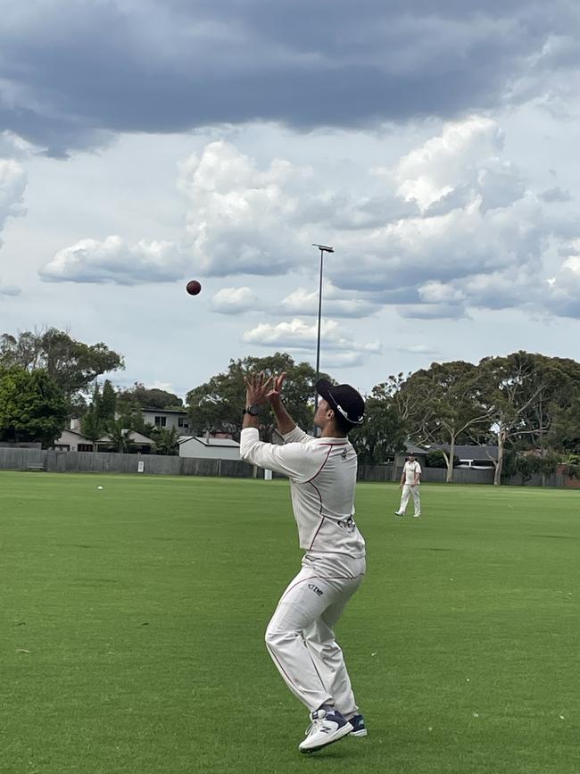 Will Russell catches Tom Smith on the boundary.