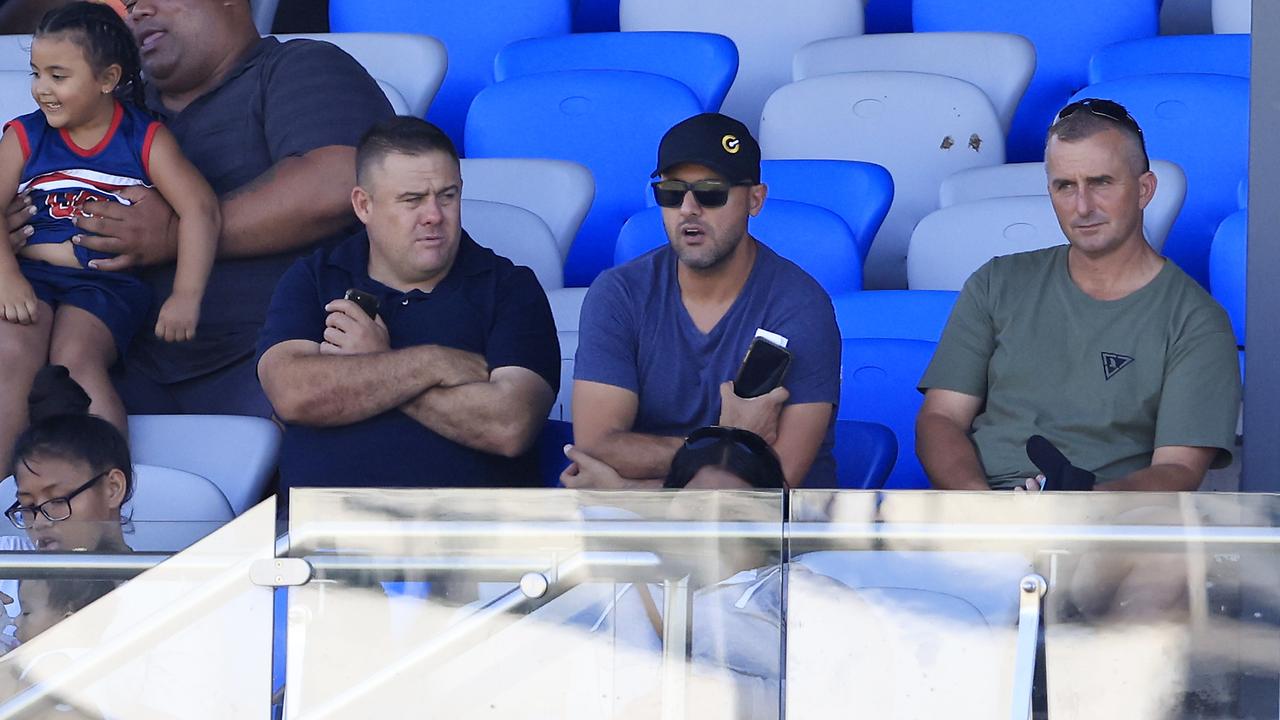 Isaac Moses is seen (C) in the stands during the NRL trial Match between the Sydney Roosters and the Canberra Raiders at Seiffert Oval.