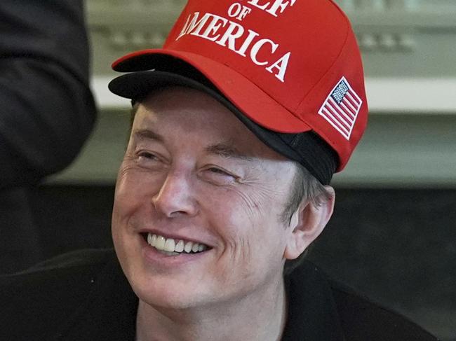 Elon Musk listens during a cabinet meeting at the White House, Wednesday, April 30, 2025, in Washington. (AP Photo/Evan Vucci)