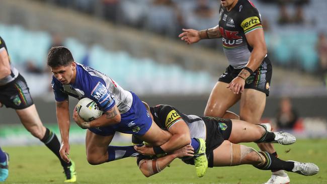 Bulldogs young gun Jeremy Marshall-King takes on the Penrith defence. Picture: Brett Costello