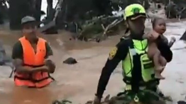 A baby has been saved from the Laos dam collapse by the Thai cave rescuers. Picture: YouTube