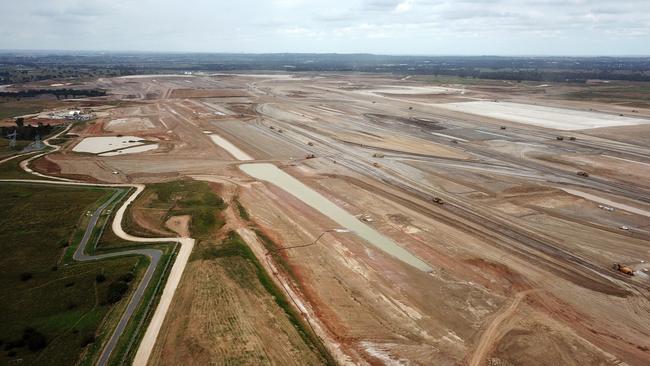 Earthmoving equipment including some of the 252 trucks being used to build the new Western Sydney Airport in Badgerys Creek. Picture: Jonathan Ng