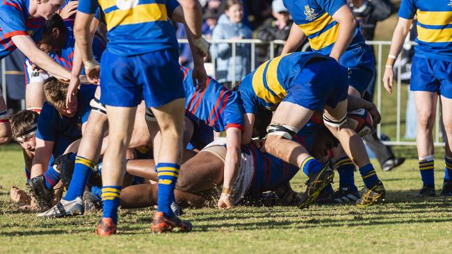 Trevor King goes over to try for Downlands against Toowoomba Grammar in the O'Callaghan Cup last year.