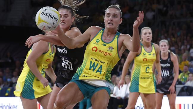 Kate Heffernan of the Silver Ferns collides with Liz Watson of the Australian Diamonds