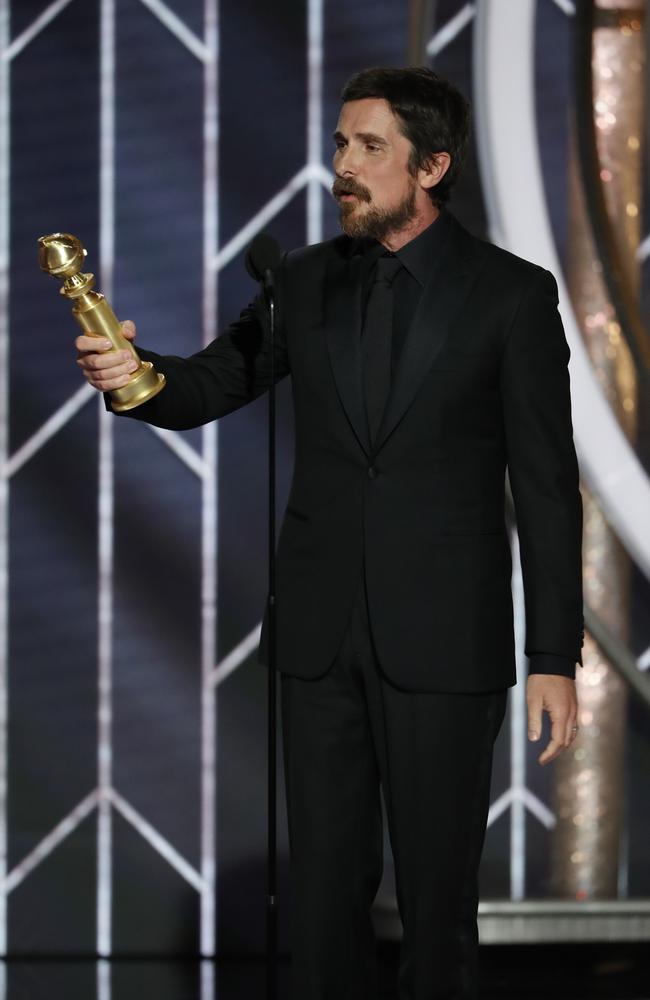 Christian Bale accepts the Best Actor in a Motion Picture Musical or Comedy award onstage during the 76th Annual Golden Globe Awards. Picture: Getty Images 