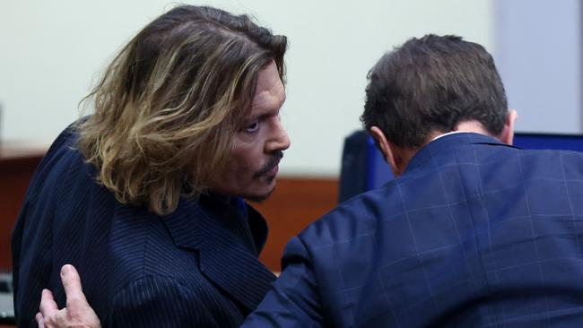 Johnny Depp with his lawyer at the trial. Picture: AFP