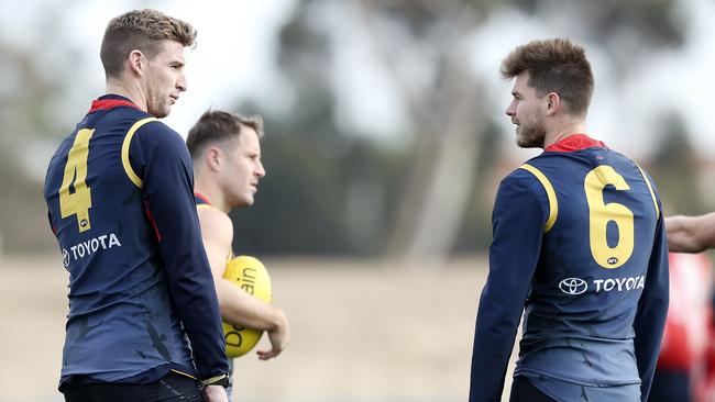 Adelaide’s Josh Jenkins and Bryce Gibbs at training ahead of their recall to the Crows side on Thursday. Picture: Sarah Reed