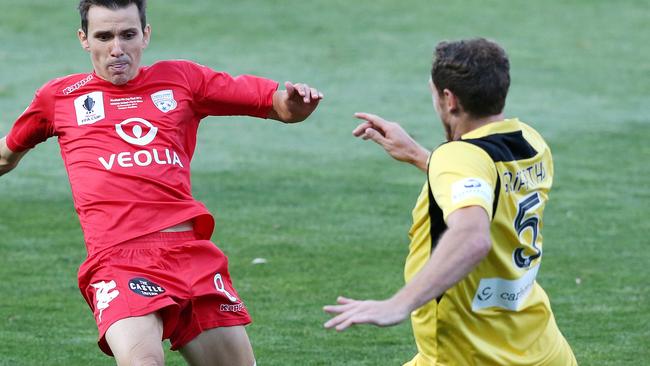 Rostyn Griffiths makes a tackle for A-League club Perth Glory.