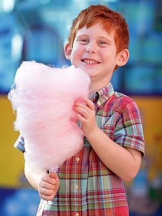 Jeremy Packer, 5, was among those who consumed 100,000 sticks, packets and buckets of fairy floss over the fortnight. Picture: John Fotiadis 