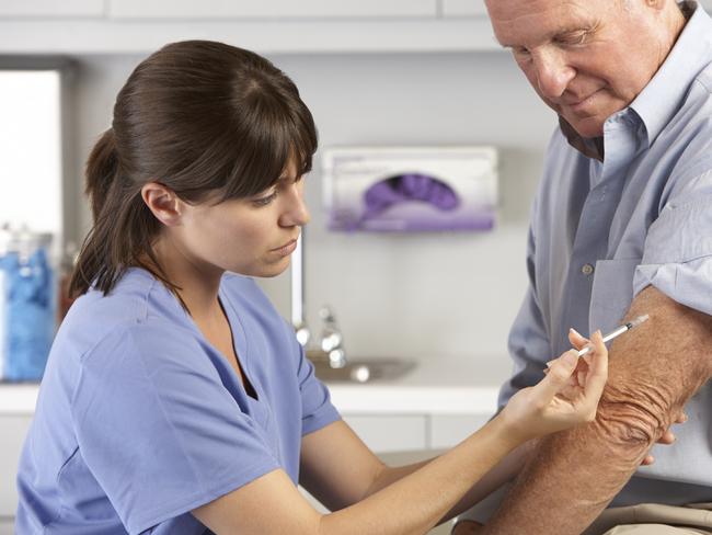 Generic photo of a person getting a flu shot. vaccination / needle / doctor / patient.   Picture: iStock