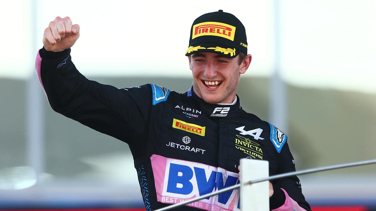 ABU DHABI, UNITED ARAB EMIRATES - NOVEMBER 26: Race winner Jack Doohan of Australia and Invicta Virtuosi Racing (14) celebrates on the podium during the Round 14 Yas Marina Feature race of the Formula 2 Championship at Yas Marina Circuit on November 26, 2023 in Abu Dhabi, United Arab Emirates. (Photo by Clive Rose/Getty Images)