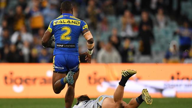 Semi Radradra breaks away to score the opening try for the Eels.