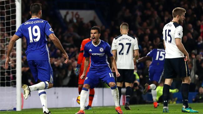 Pedro (C) of Chelsea celebrates scoring.
