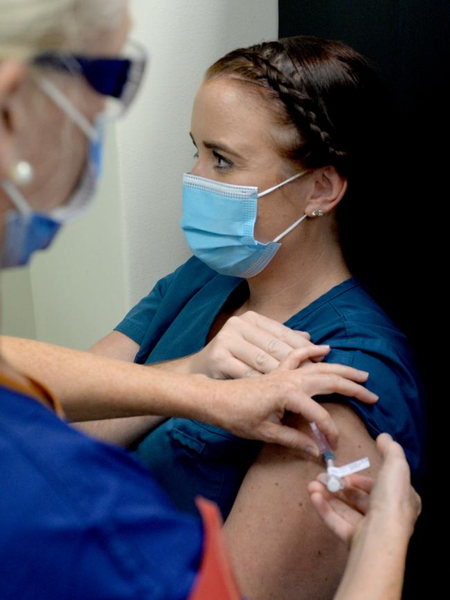 ICU nurse Jaiden gets her COVID vaccine at The Alfred hospital. Picture: Andrew Henshaw