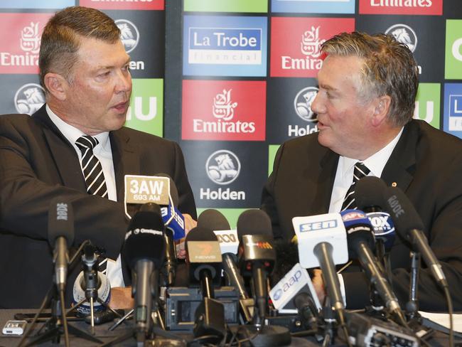 Gary Pert and Eddie McGuire shake hands at the press conference. Picture: Getty