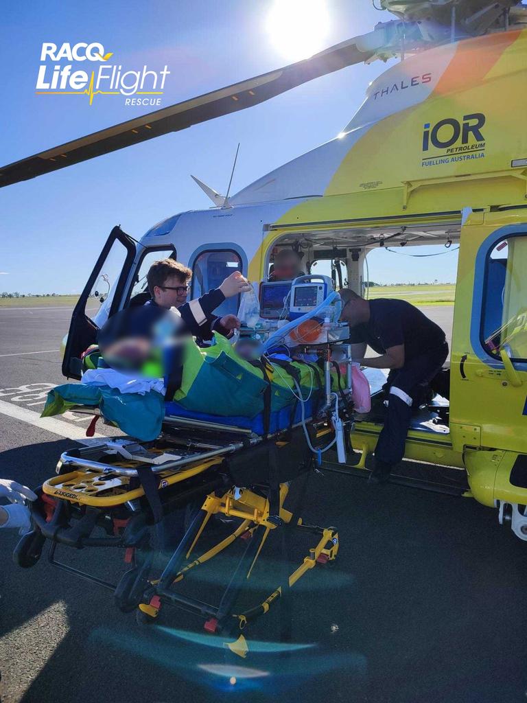 A man has been flown to hospital after he was crushed by road roller along Warrego Hwy. Photo: RACQ Lifeflight