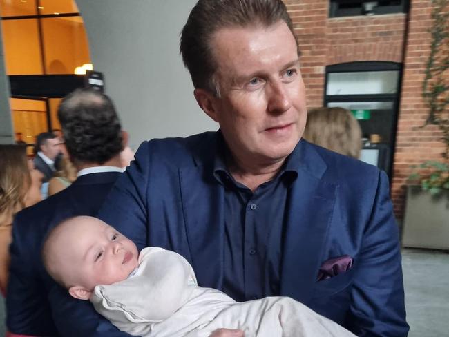 Peter Overton was seen cradling Airlie Walsh's baby boy.