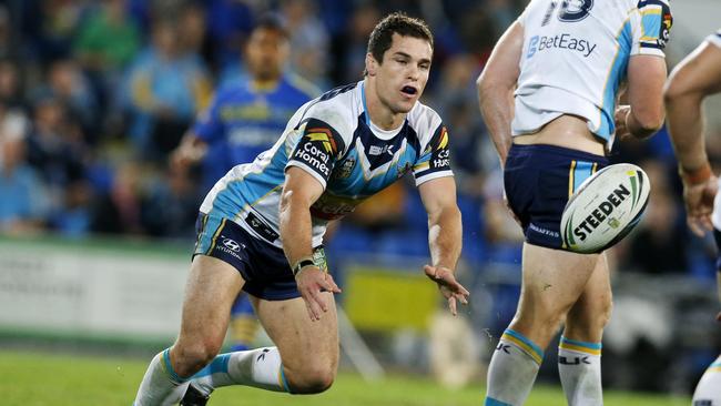 Mortimer passes out of dummy-half in a match for the Titans at Cbus Super Stadium. Picture: Jerad Williams