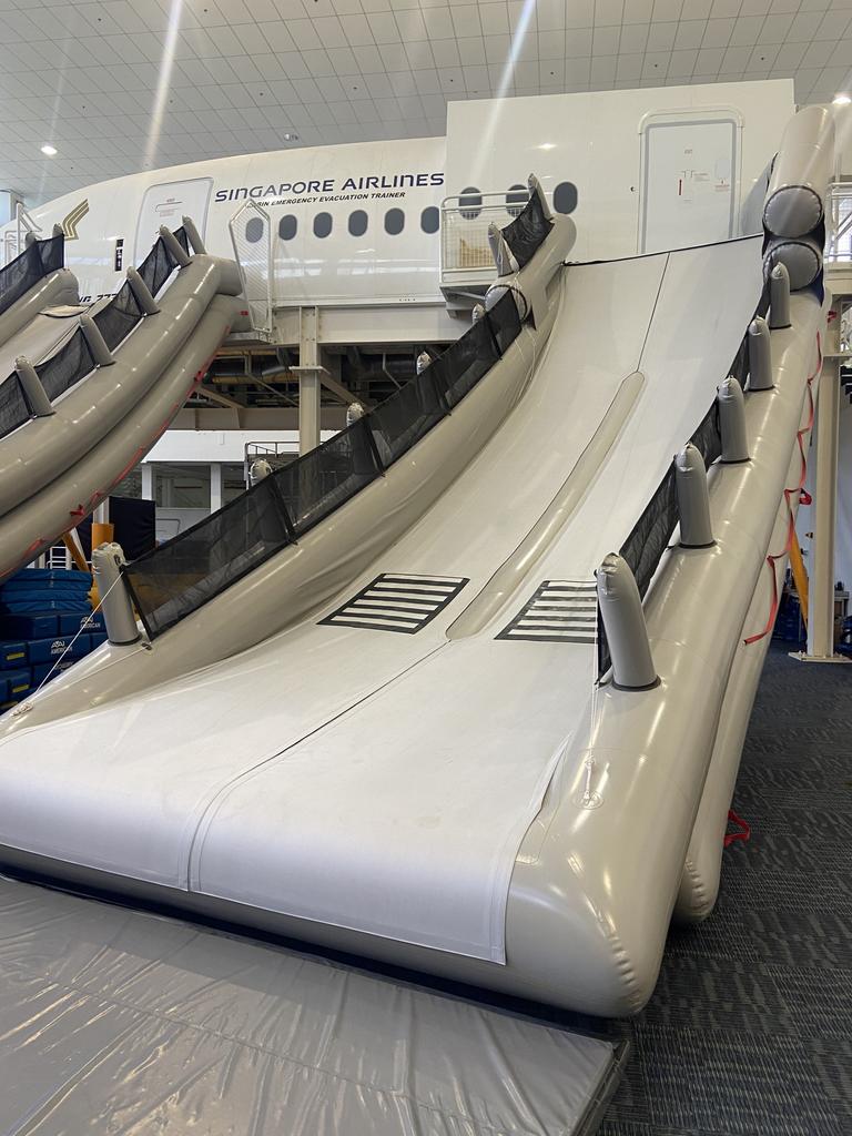 The practice emergency slides at the Singapore Airlines crew training facility.