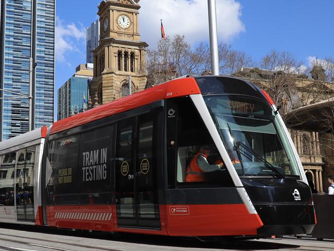 Premier Gladys Berejiklian and Minister for Transport Andrew Constance ride on the first light rail vehicle test from Town Hall to Circular Quay in Sydney, Wednesday, August 28, 2019. (AAP Image/Steven Saphore) NO ARCHIVING